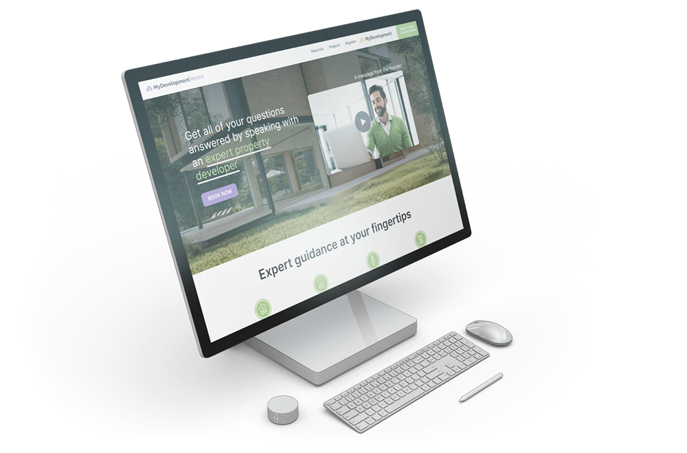 Laptop screen displaying the MyDevelopment platform with the headline "Get all of your questions answered by speaking with an expert property developer"